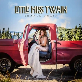 Pochette de l'album Little Miss Twain de Shania Twain, assise dans un pick-up rouge