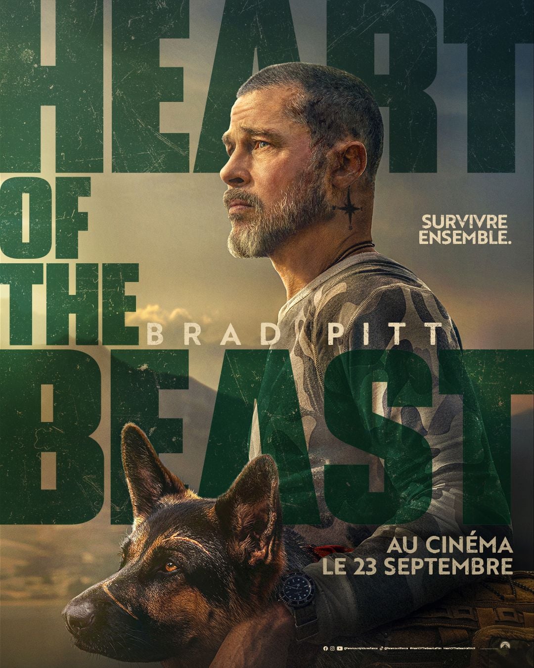 Affiche officielle du film Heart of the Beast : Brad Pitt et son berger allemand Odin, mention Survivre ensemble, au cinéma le 23 septembre