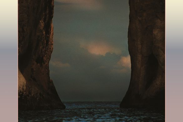 Pochette de I Wrote You A Letter, dixième album de M83 : deux falaises sombres encadrant une mer au crépuscule