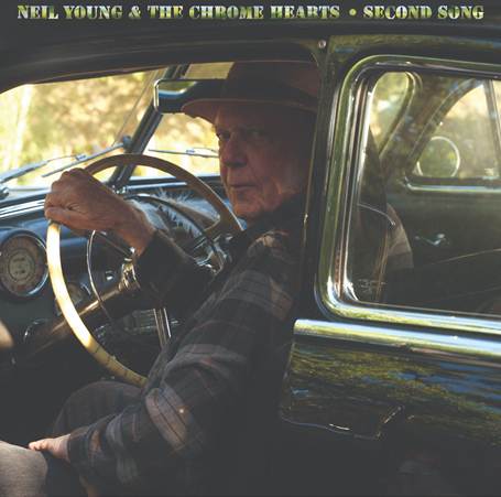 Pochette de l'album Second Song de Neil Young & The Chrome Hearts : Neil Young au volant d'une vieille voiture